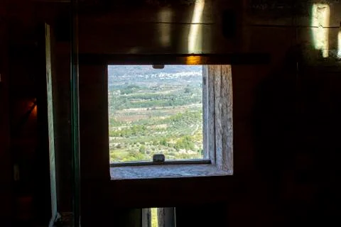 Views from inside the Almudaina Tower through the window. Stock Photos
