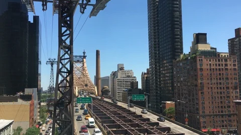 Views from inside the cable car that connects Manhattan with Roosvelt Island Stock Footage 128973723