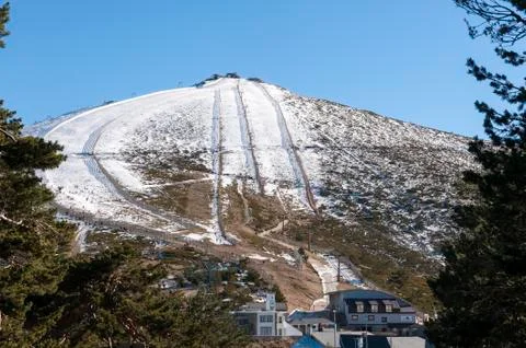 Views of Navacerrada Ski Resort from behind the forest Stock Photos