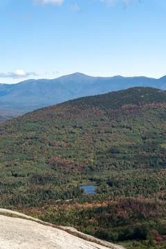 Views overlooking White Mountain National Forest during the beginning of Fall. Stock Photos