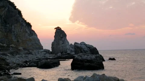 Views of the pink sunset on the rocks - Coast Sunset Amara In Turkey Stock Footage 42453503