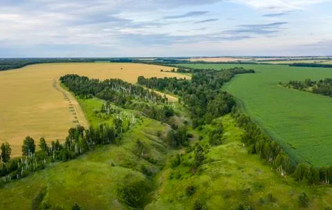 Views of the ravines, the fields with the quadcopter in the rays Foto stock
