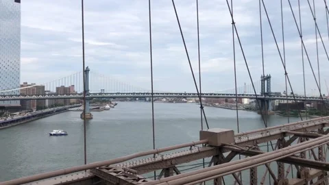 VIEWS OFF THE SIDE OF THE BROOKLYN BRIDGE IN NYC Stock Footage 132752213