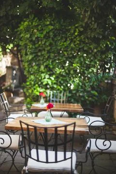 Views of tables in an empty restaurant Stock Photos