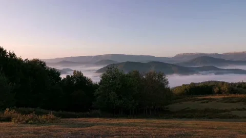 Views of the valley covered with low clouds Stock Footage 140450922