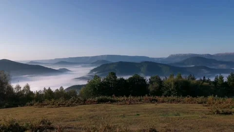 Views of the valley covered with low clouds Stock Footage 140450970