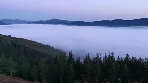 Views of the valley covered with low clouds Stock Footage 140451091