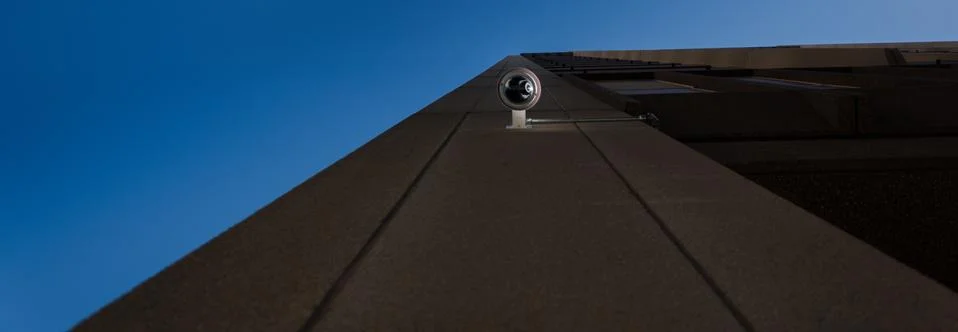 Vigilance camera on a skycraper Stock Photos