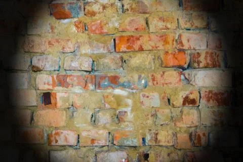 Vignette in the form of a lantern on a brown brick wall. Stock Photos