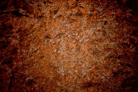 Vignetted stone wall background with lots of texture Stock Photos