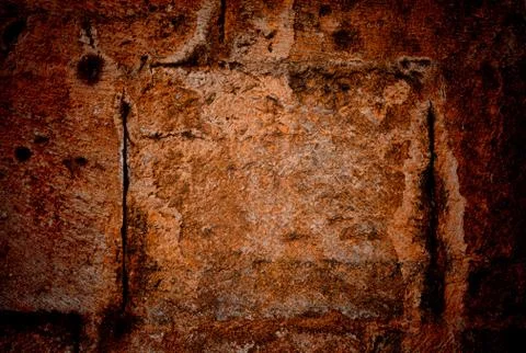 Vignetted stone wall background with lots of texture Stock Photos