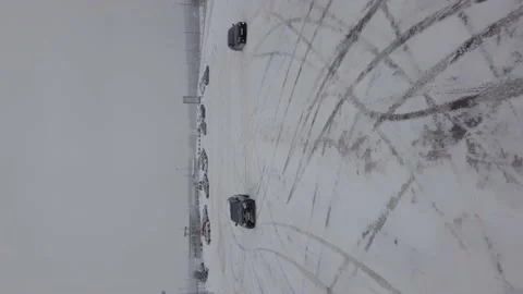 Vigorous driving in the snow in winter. (vertical video) Stock Footage 147491961