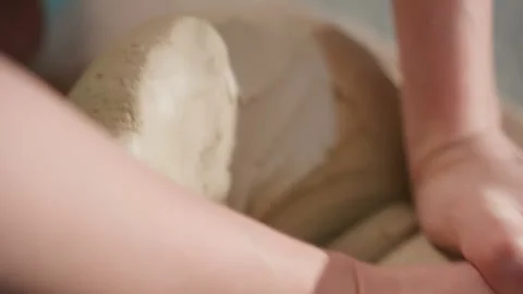 Vigorous molding captures tactile energy and focused motion. Pottery artist Stock Footage 337362629
