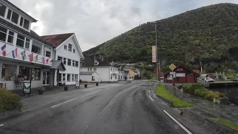 Vik, Norway; September 27 2024: Driving through the rainy streets of Vik in.. Video stock 328249666