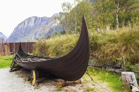 Viking ship with mountains on the background Stock Photos