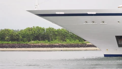 Viking sky cruise ship hull or bow entering benoa port harbor in bali Stock Footage 329401034