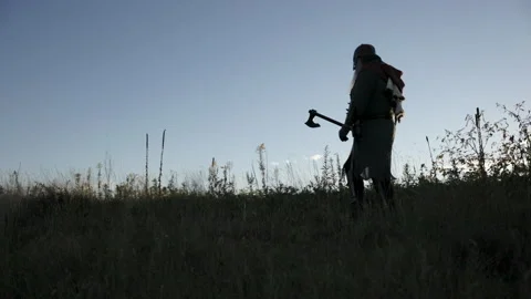 Viking Walking Dramatically with an Axe - Cosplay Costume 库存影片 266162871