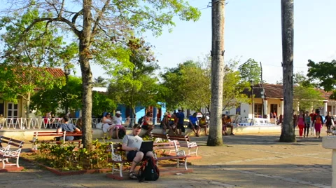 Viles Cuba with Main Square people relaxing and locals walking in small town Stock-Footage 65356908