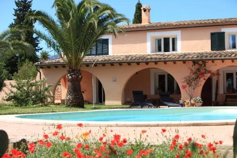 Villa and pool Stock Photos