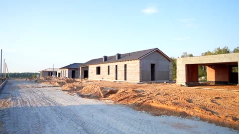 Villa construction. Prefab house under construction. Suburban house Construction Stock Footage 285849669