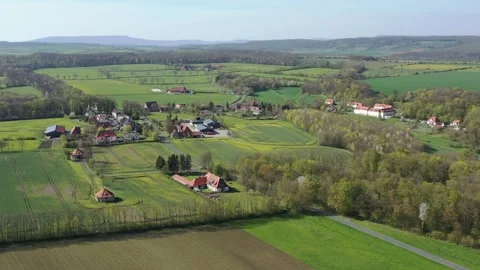 The village of Altefeld between the fields in North Hesse Stock Footage 240497227