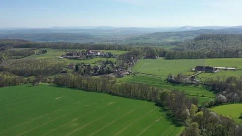 The village of Altefeld between the fields in North Hesse Stock Footage 240646131