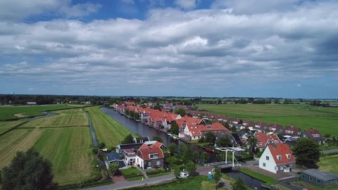 Village and marshlands in Holland, aerial. Stock Footage