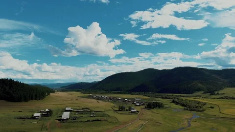 Village and mountains Stock Footage 117348701
