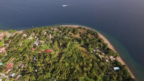 A village on a beach island Stock Footage 242282913