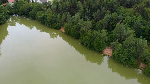 Village behind a nice lake Stock Footage 112181773