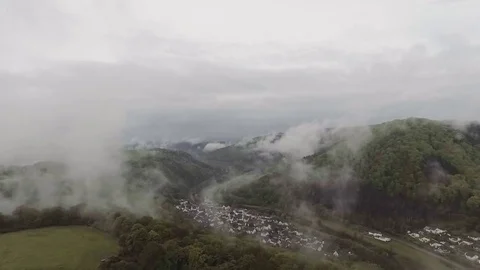 Village in the clouds aerial Stock Footage 80422842