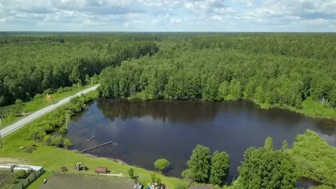 Village on the edge of the lake Stock Footage 139345979