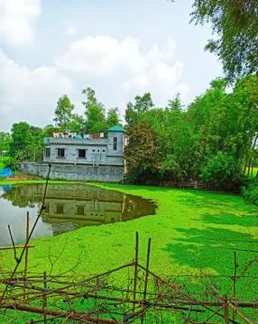 Village house with water and nature weather Stock Photos