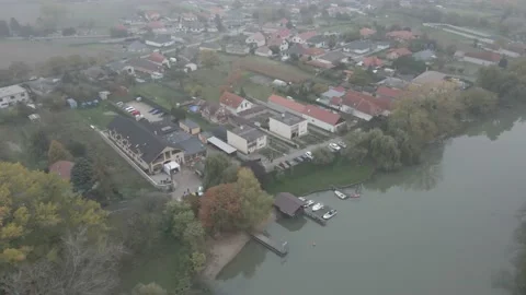 Village landscape at a river Stock Footage 232485416