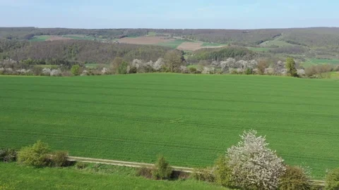 The village of Lüderbach between the fields in North Hesse Stock Footage 240647282