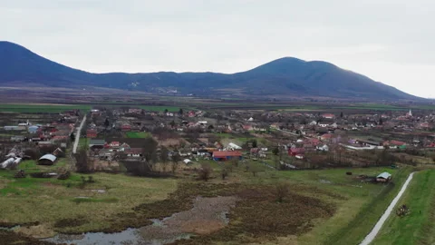 Village in the plain below the hill Stock Footage 231910030