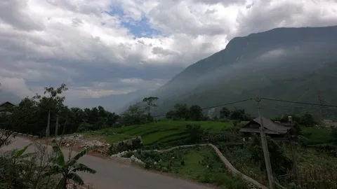 Village road in the mountains, cloud view, time lapse Stock Footage 155830165