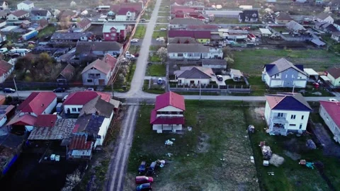A village at sunset, captured from a drone's perspective. Video stock 272993486