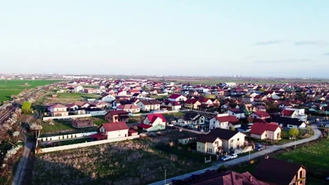 A village at sunset, captured from a drone's perspective. Video stock 272993512
