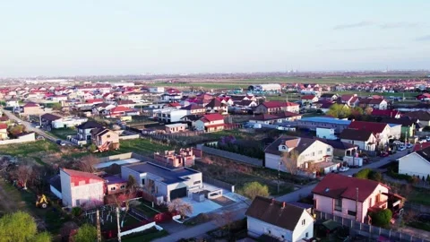 A village at sunset, captured from a drone's perspective. Video stock 272993684