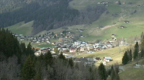 Village in the valley with clouds' shadow Stock Footage 114004