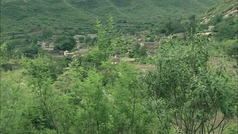 Village in the valley Stock Footage 235280166