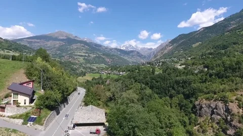 Village in the valley of the mountain Stock Footage 79564682