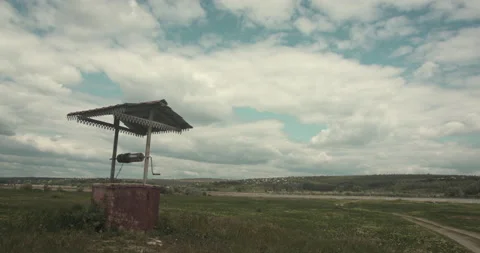 Village well. Landscape of a typical eastern european village. Stock Footage 131734574