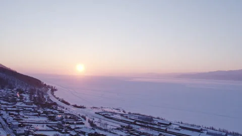 Village in winter by the lake Stock Footage 282698369
