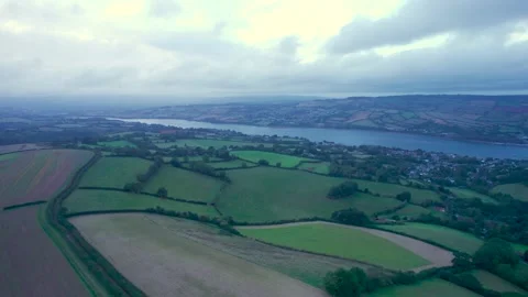 Villages and Fields over Labrador Bay and River Teign from a drone, Devon Video stock 161701516