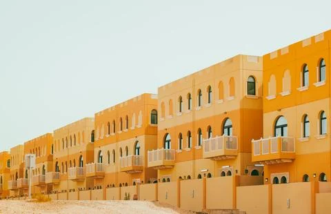 Villas compound development in a bright sunny day. Living house with apartm.. Stock Photos
