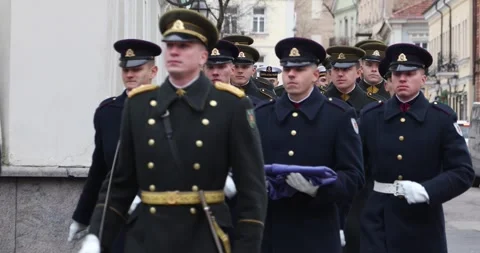 Vilnius honor guard marching with drummer along old town street Video stock 321050259