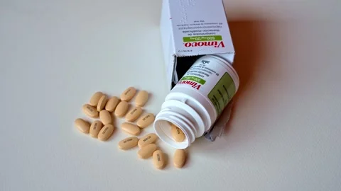 VIMOVO contains two different medicines called naproxen and esomeprazole. Stock Footage 325418073