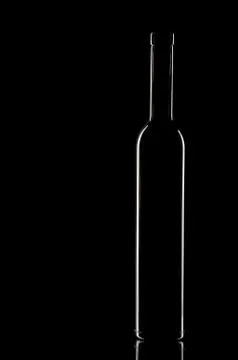 Vine bottle on the black background Foto stock